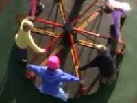 Children playing on a roundabout